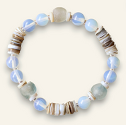 Beaded bracelet with blue, gray, and brown beads on a white background